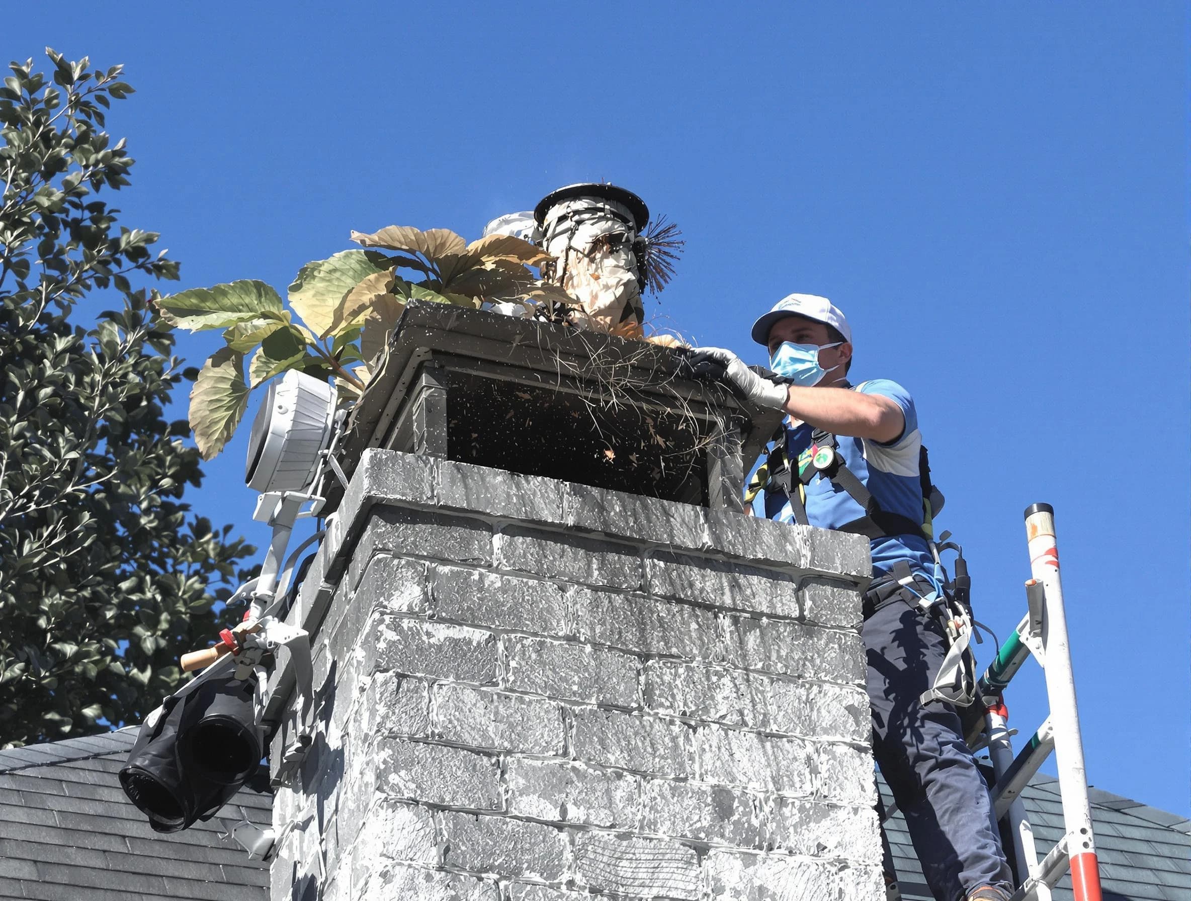 Middletown Chimney Sweep specialist performing chimney cleaning in Middletown, NJ