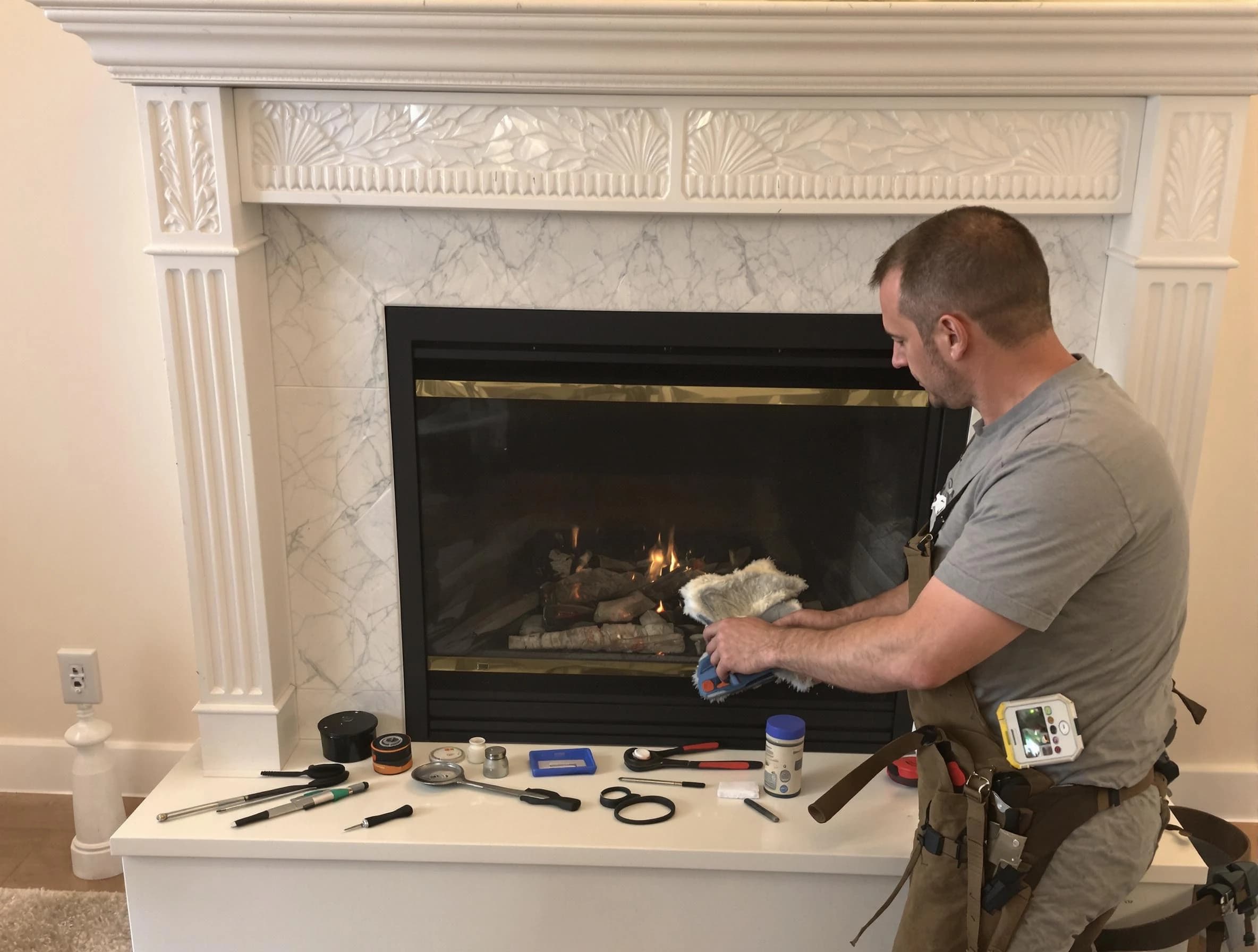 Middletown Chimney Sweep performing fireplace maintenance in Middletown, NJ